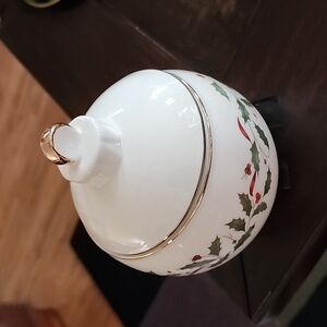 Lenox Holiday Ornament Candy Jar is a candy jar that is shaped like an ornament
